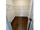 Walk-in closet with wire shelving and hardwood floors at 350 Feldspar Ln, Ladson, SC 29456