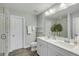 Bathroom with double vanity, modern fixtures and grey walls at 3809 Tupelo Branch Row, Mount Pleasant, SC 29429