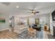 Spacious living room with hardwood floors, comfy seating, and a cozy atmosphere at 3809 Tupelo Branch Row, Mount Pleasant, SC 29429