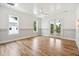 Bright bedroom with hardwood floors and access to a deck at 3908 Delinger Dr, Mount Pleasant, SC 29466