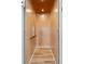 Private home elevator with wood paneling and hardwood floor at 3908 Delinger Dr, Mount Pleasant, SC 29466