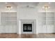 Living room features a marble fireplace flanked by built-in shelves at 3908 Delinger Dr, Mount Pleasant, SC 29466