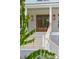 Double front doors with glass panels and copper lanterns at 3908 Delinger Dr, Mount Pleasant, SC 29466