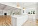 Open concept kitchen with island overlooking living room and deck at 3908 Delinger Dr, Mount Pleasant, SC 29466