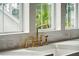 White quartz countertop with gold faucet and farmhouse sink at 3908 Delinger Dr, Mount Pleasant, SC 29466