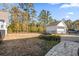 Large backyard with fire pit, patio, and detached garage at 3913 Maidstone Dr, Mount Pleasant, SC 29466