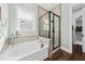 Bathroom with soaking tub and walk-in shower at 3913 Maidstone Dr, Mount Pleasant, SC 29466