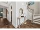 Bright entryway with hardwood floors and elegant staircase at 3913 Maidstone Dr, Mount Pleasant, SC 29466
