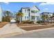 Two story home with gray siding, front porch, and landscaping at 3913 Maidstone Dr, Mount Pleasant, SC 29466