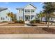 Two-story house with gray siding, white trim, and a landscaped yard at 3913 Maidstone Dr, Mount Pleasant, SC 29466