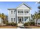 Two-story home with gray siding, white trim, and a front porch at 3913 Maidstone Dr, Mount Pleasant, SC 29466