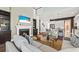 Open living area showcasing a fireplace and kitchen views at 3913 Maidstone Dr, Mount Pleasant, SC 29466