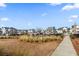 Community playground with playset and walking path at 3913 Maidstone Dr, Mount Pleasant, SC 29466