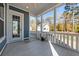Spacious screened porch with white railings and backyard view at 3913 Maidstone Dr, Mount Pleasant, SC 29466