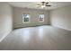 Bright bedroom with ceiling fan and tile floors at 4140 Home Town Ln, Ravenel, SC 29470