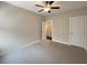 Bedroom with tile floors, ceiling fan and access to bathroom at 4140 Home Town Ln, Ravenel, SC 29470