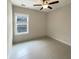 Bedroom with tile floors and a window with blinds at 4140 Home Town Ln, Ravenel, SC 29470