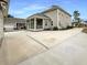 Two-story house with screened porch and large concrete driveway at 4140 Home Town Ln, Ravenel, SC 29470