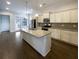 Modern kitchen with granite countertops and stainless steel appliances at 4140 Home Town Ln, Ravenel, SC 29470