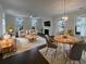 Spacious living room with hardwood floors, fireplace, and ample natural light at 4140 Home Town Ln, Ravenel, SC 29470