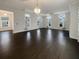 Bright living room with hardwood floors and a fireplace at 4140 Home Town Ln, Ravenel, SC 29470