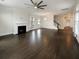 Large living room featuring hardwood floors and a fireplace at 4140 Home Town Ln, Ravenel, SC 29470