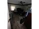 Messy bedroom with hardwood floors, a sleigh bed, and ceiling fan at 4328 Helene Dr, North Charleston, SC 29418