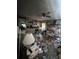 Cluttered living room with built-in shelving and lots of items at 4328 Helene Dr, North Charleston, SC 29418