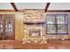 Brick fireplace with brass trim in living room at 4344 Bream Rd, North Charleston, SC 29418