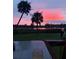 Relaxing sunset view from a deck, glass of wine present at 4960 Lambs Rd, North Charleston, SC 29418