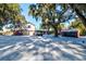 House exterior with detached garage and shed, covered in snow at 4960 Lambs Rd, North Charleston, SC 29418