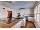 Kitchen with white cabinets, granite countertops, and island at 4960 Lambs Rd, North Charleston, SC 29418