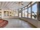 Bright sunroom featuring a view and ceiling fan at 4960 Lambs Rd, North Charleston, SC 29418