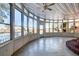 Bright sunroom featuring a view and ceiling fan at 4960 Lambs Rd, North Charleston, SC 29418