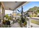 Inviting front porch with seating and plants at 5103 Hyde Park Village Ln, North Charleston, SC 29405