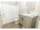 Bathroom includes a shower/tub combo and updated vanity at 520 Branch Bend Way, Cross, SC 29436