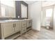 Bathroom boasts a double vanity and modern fixtures at 520 Branch Bend Way, Cross, SC 29436