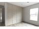 Bedroom with wood-like plank flooring and an accent wall at 520 Branch Bend Way, Cross, SC 29436