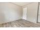 Spacious bedroom with wood-look flooring and closet at 520 Branch Bend Way, Cross, SC 29436
