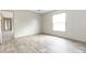 Well-lit bedroom featuring wood-look floors and ample space at 520 Branch Bend Way, Cross, SC 29436