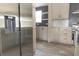 Stainless steel refrigerator in modern kitchen with light wood cabinets at 520 Branch Bend Way, Cross, SC 29436
