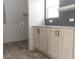 Laundry area with light wood cabinets and hookups for washer and dryer at 520 Branch Bend Way, Cross, SC 29436