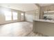 Bright living room with vinyl plank flooring and large windows at 520 Branch Bend Way, Cross, SC 29436