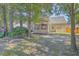 Private backyard with screened porch and trees at 602 Leaning Pin Ct, Summerville, SC 29485