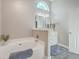 Relaxing bathroom with soaking tub and double vanity at 602 Leaning Pin Ct, Summerville, SC 29485