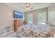 Bright bedroom featuring a queen-size bed and two windows at 602 Leaning Pin Ct, Summerville, SC 29485