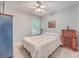 Cozy bedroom with a queen bed, window, and vintage radio at 602 Leaning Pin Ct, Summerville, SC 29485