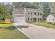Two-story house with attached garage and landscaped lawn at 602 Leaning Pin Ct, Summerville, SC 29485