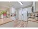 Modern kitchen with white cabinets, granite countertops, and stainless steel appliances at 602 Leaning Pin Ct, Summerville, SC 29485