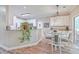 Kitchen with white cabinets, granite countertops, and a breakfast nook at 602 Leaning Pin Ct, Summerville, SC 29485